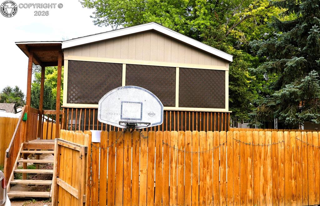 Caption: Front entry into the sunroom, which leads inside.