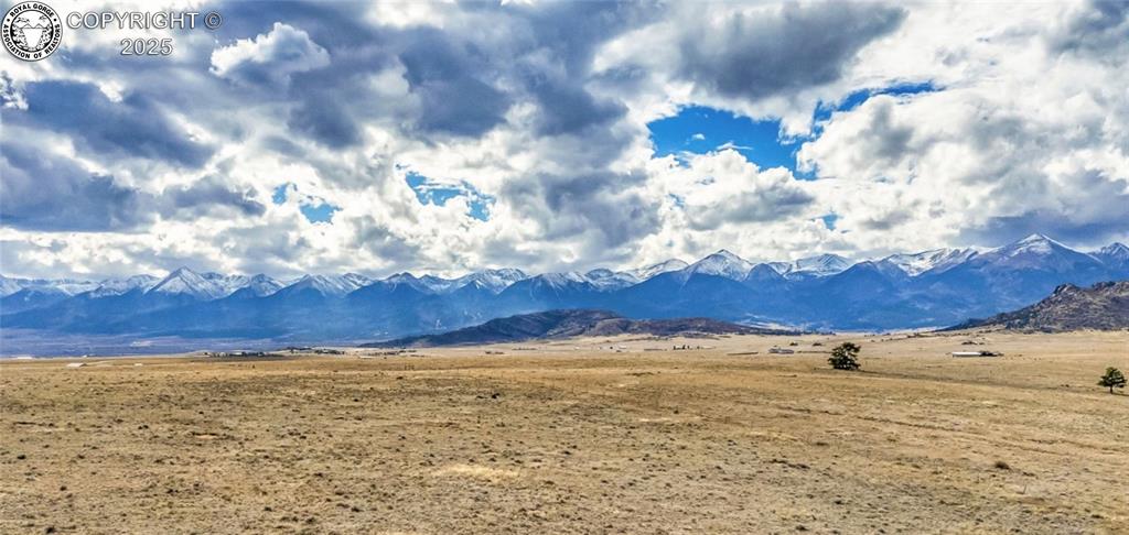 Caption: View of mountain backdrop featuring rural landscape