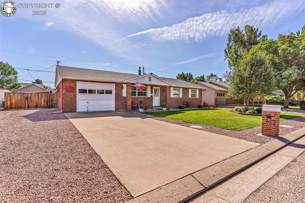 Caption: Welcome to 1000 Apple Lane, a beautifully maintained home offering comfortable single-level living o