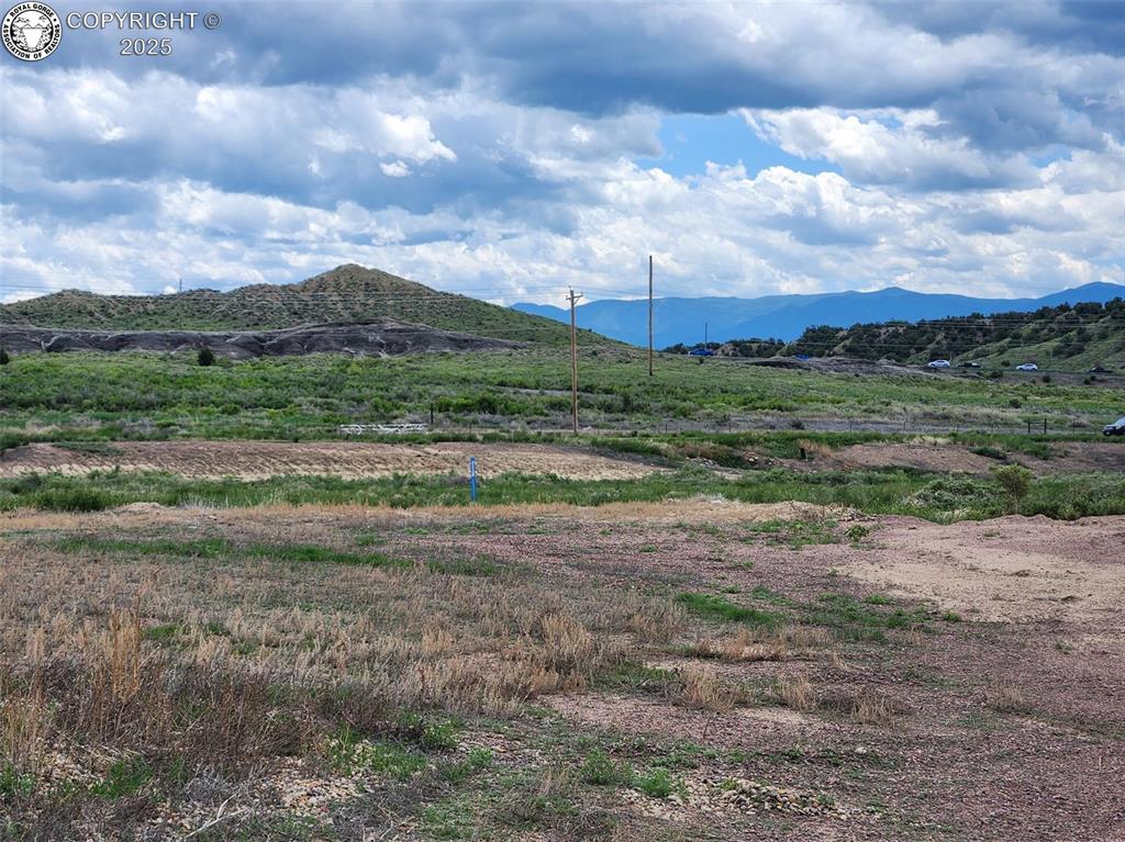 Caption: View of mountain background with rural landscape
