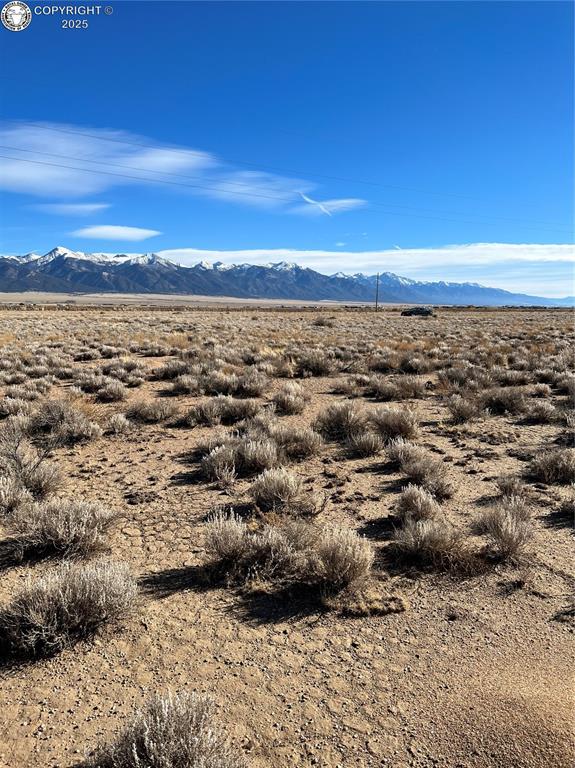 Caption: Mountain view with a desert landscape