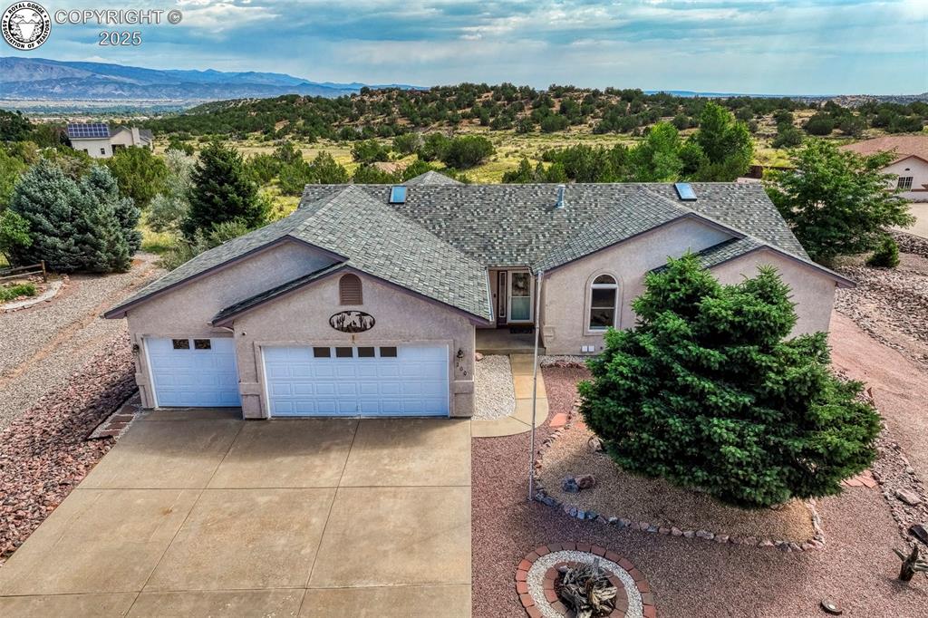 Caption: Views galore, over 2 acres of privacy, and fresh updates throughout this spacious walkout rancher cr