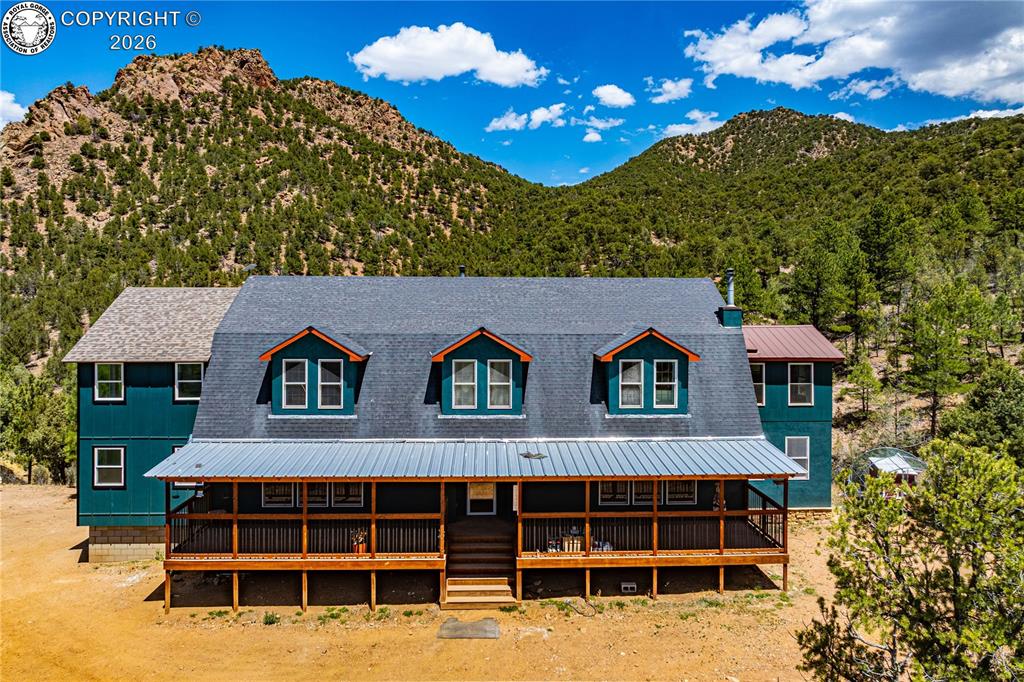 Caption: Over 5600 SF located on 20 Acres bordering over 28,000 Acres of BLM and State Trust Land