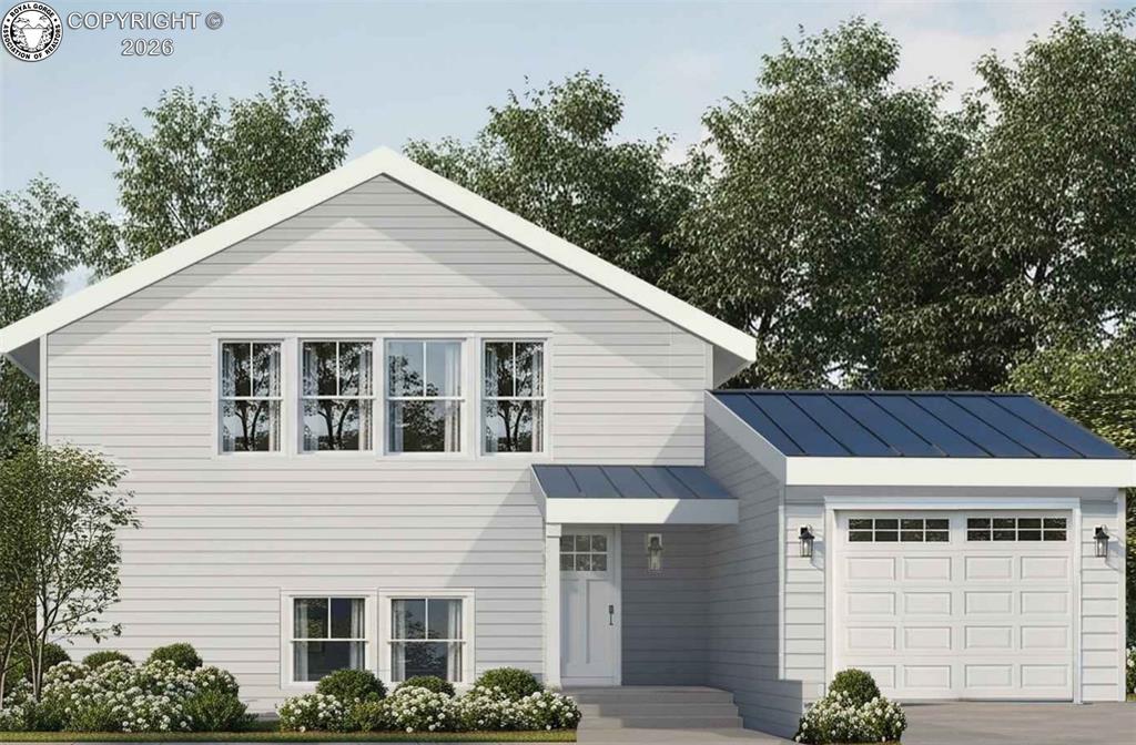 Caption: View of front of house featuring a standing seam roof and a metal roof - WITH 1-CAR ATTACHED GARAGE