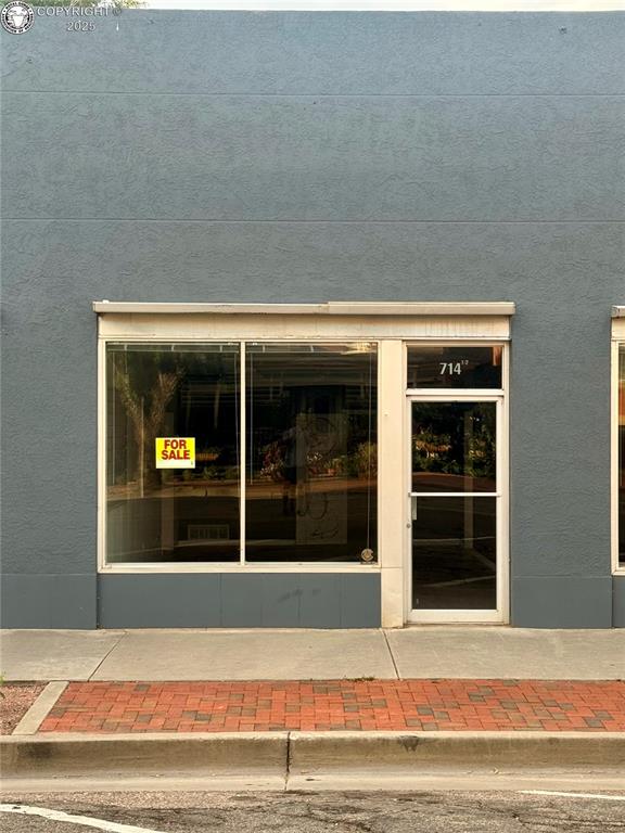 Caption: Exterior view of stucco siding