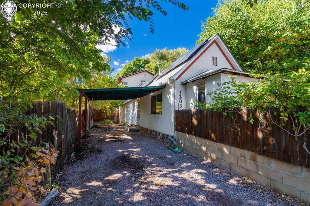 Caption: View of side of property with driveway