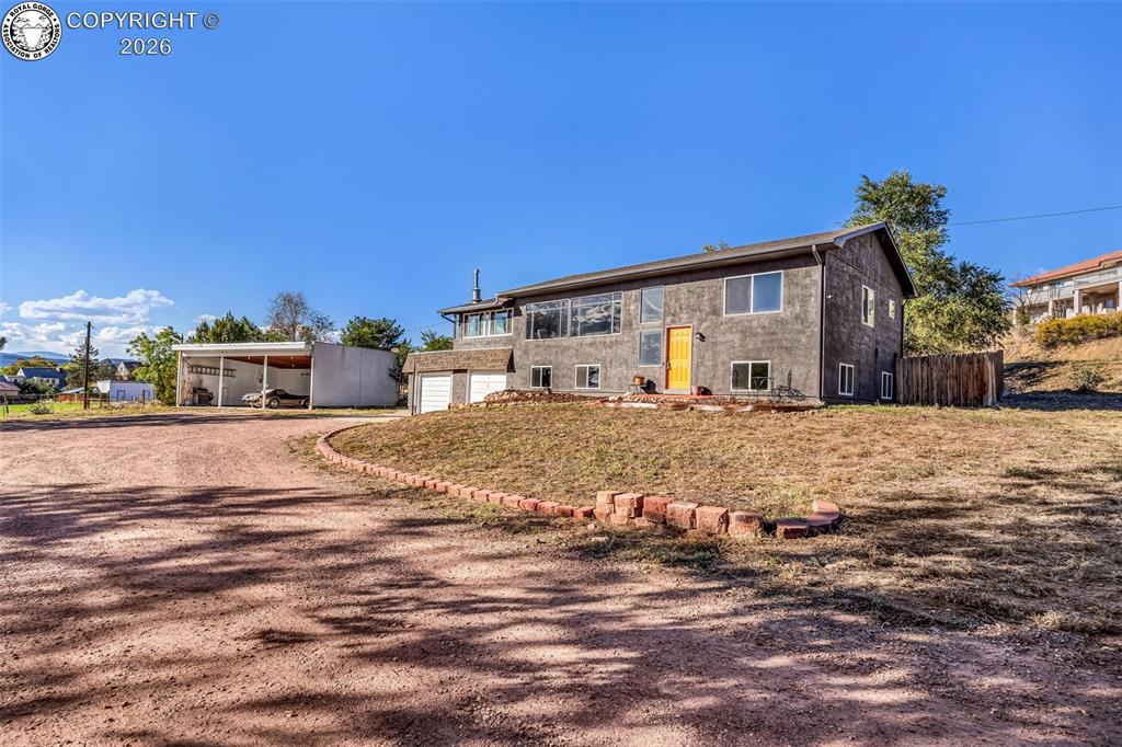 Caption: Welcome Home! 675 Dozier sits on a .97 Acre lot with an attached 2 car garage and oversized 3 vehicl