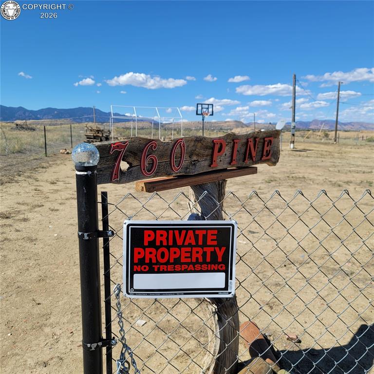 Caption: Gated front entrance on Pine Street