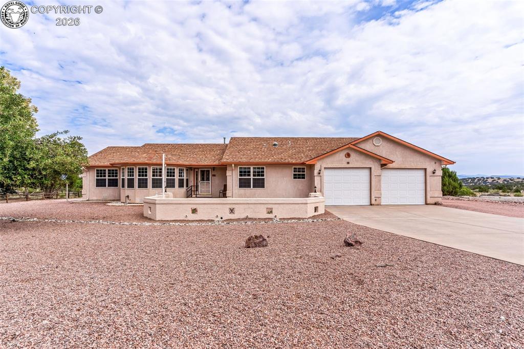 Caption: Welcome home to 53 Savage Loop, Canon City!