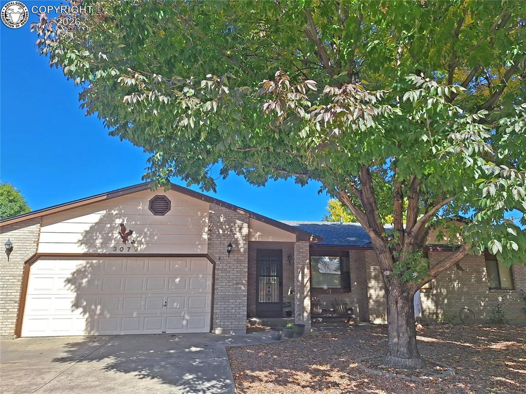 Caption: Photos from when the trees out front are leafed out. Lots of shade which keeps the home cooler.