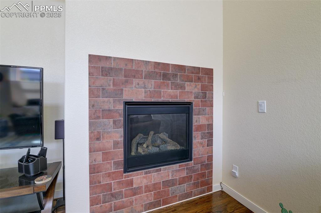 Image 16 of 45: Gas log fireplace