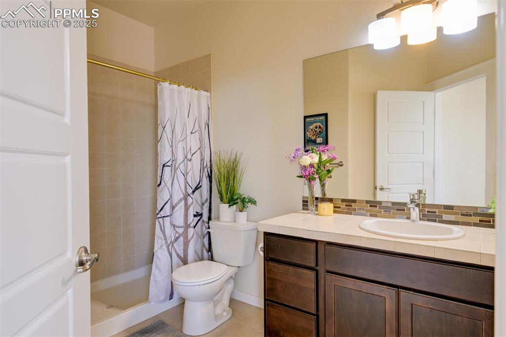 Image 23 of 45: Main level bathroom