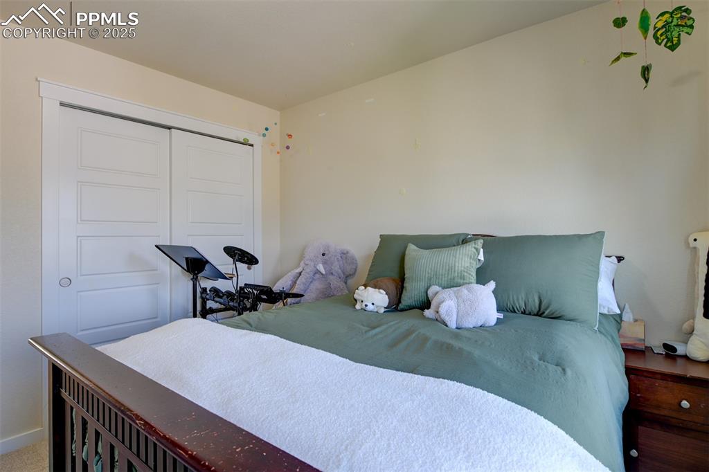 Image 34 of 45: Upper level bedroom (4 bedrooms upstairs)