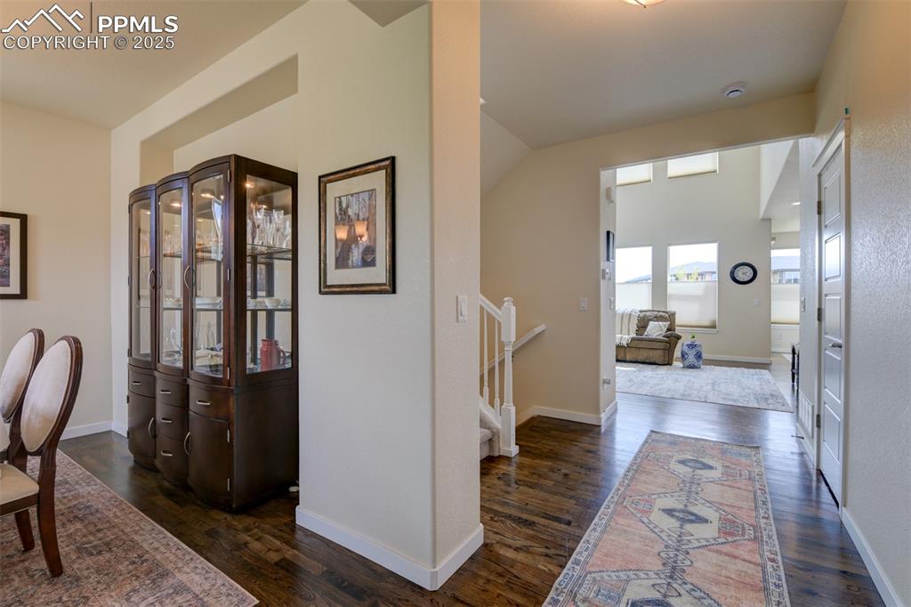 Image 6 of 45: Main level features handsome hardwood flooring