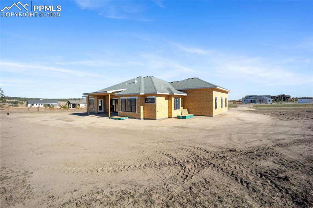 Image 3 of 6: Back/side of home