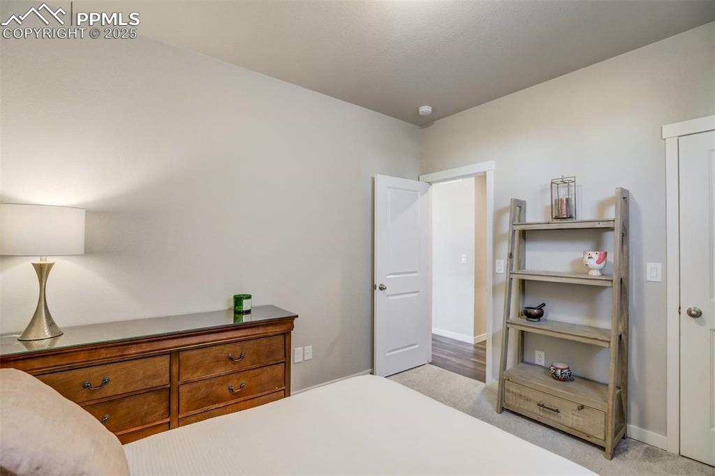 Image 16 of 44: Main level bedroom