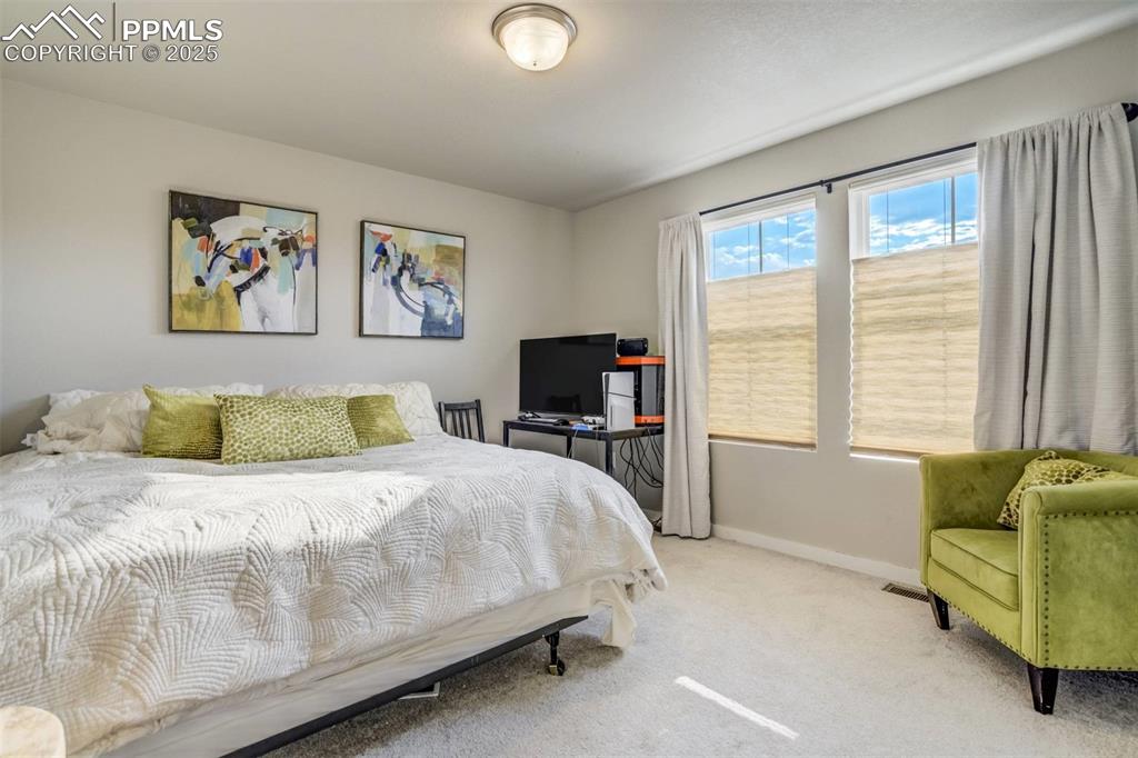 Image 27 of 44: Oversized auxiliary bedroom