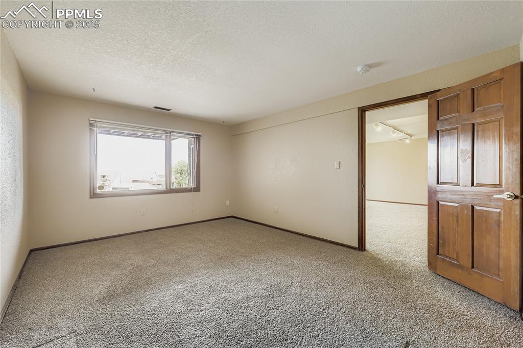 Image 30 of 39: Bedroom