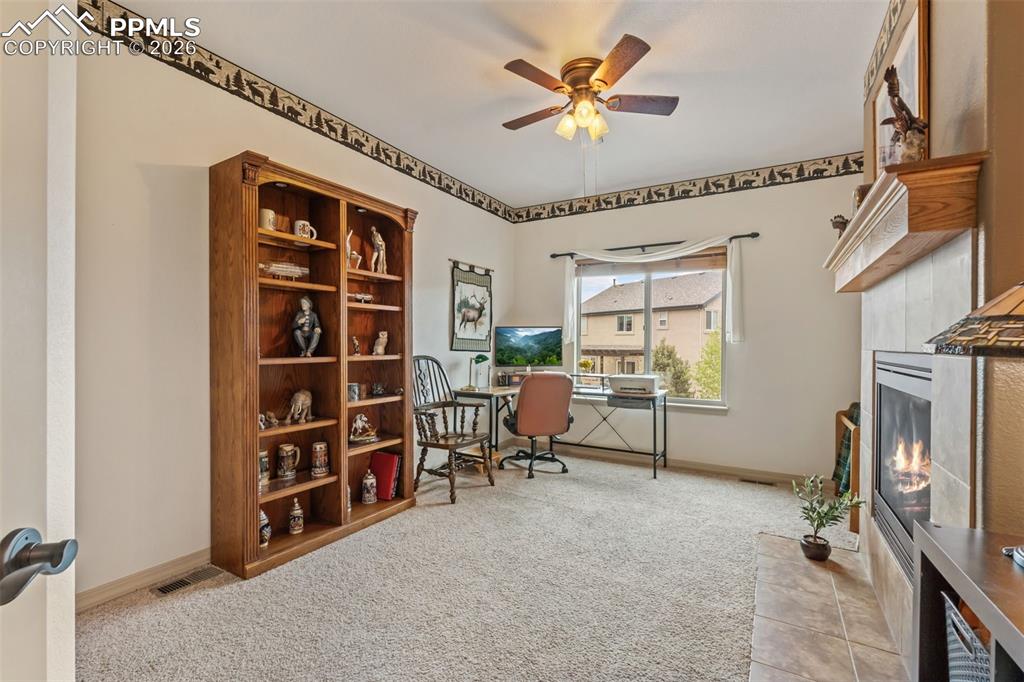 Image 22 of 50: Office or main level bedroom with closet