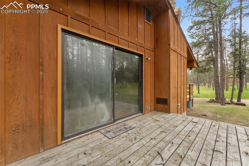 Image 32 of 43: Side deck off of the dining room