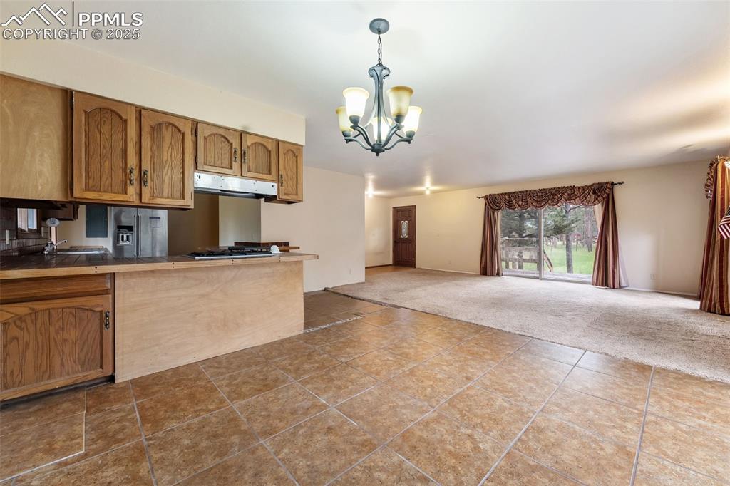 Image 6 of 43: Dining room with ceramic tile
flooring