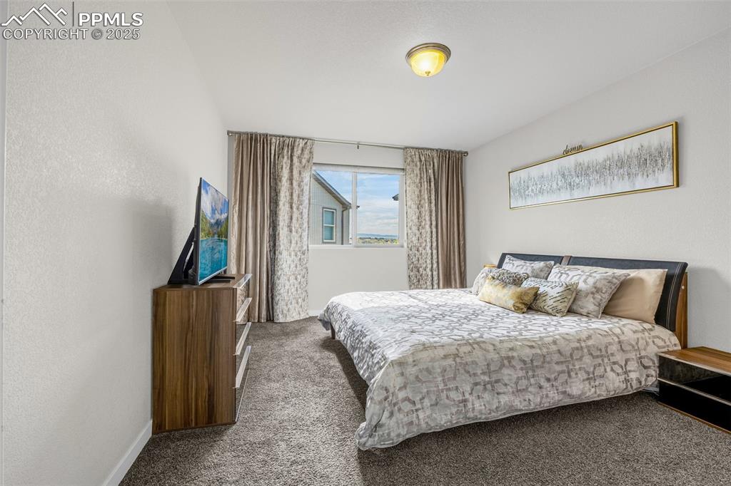 Image 16 of 39: Master Bedroom