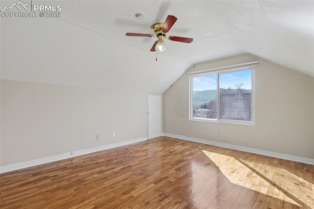 Image 15 of 28: Upper level bedroom.