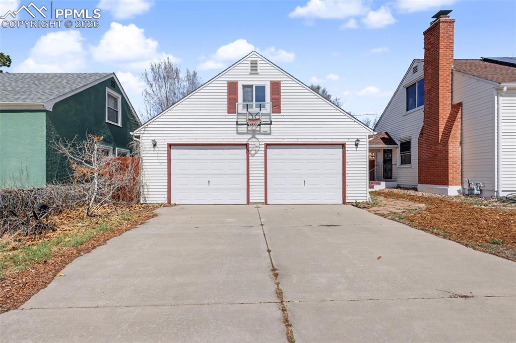 Image 28 of 28: The garage is 26x24, with double doors and functional attic space.