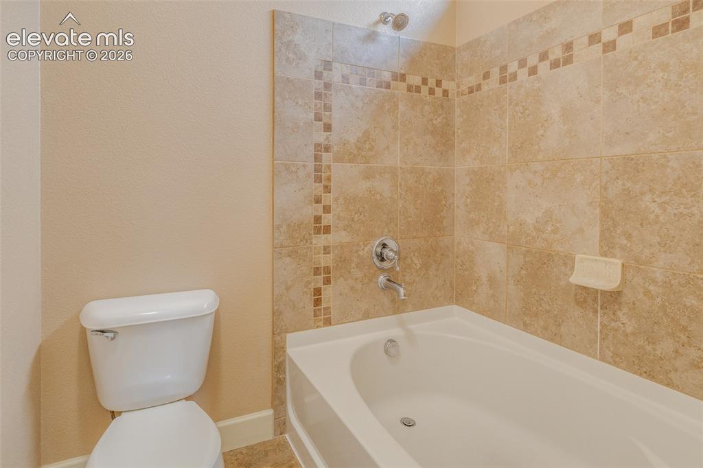 Image 12 of 36: Master Bathroom