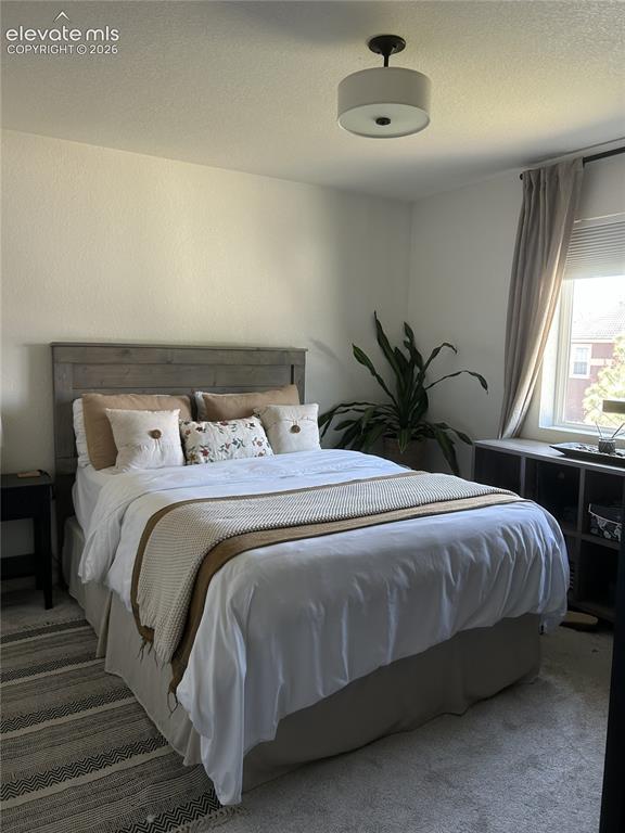 Image 11 of 15: Bedroom