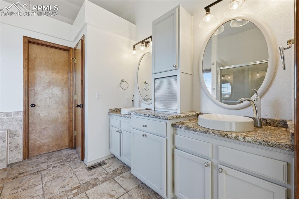 Image 21 of 50: Master Bathroom