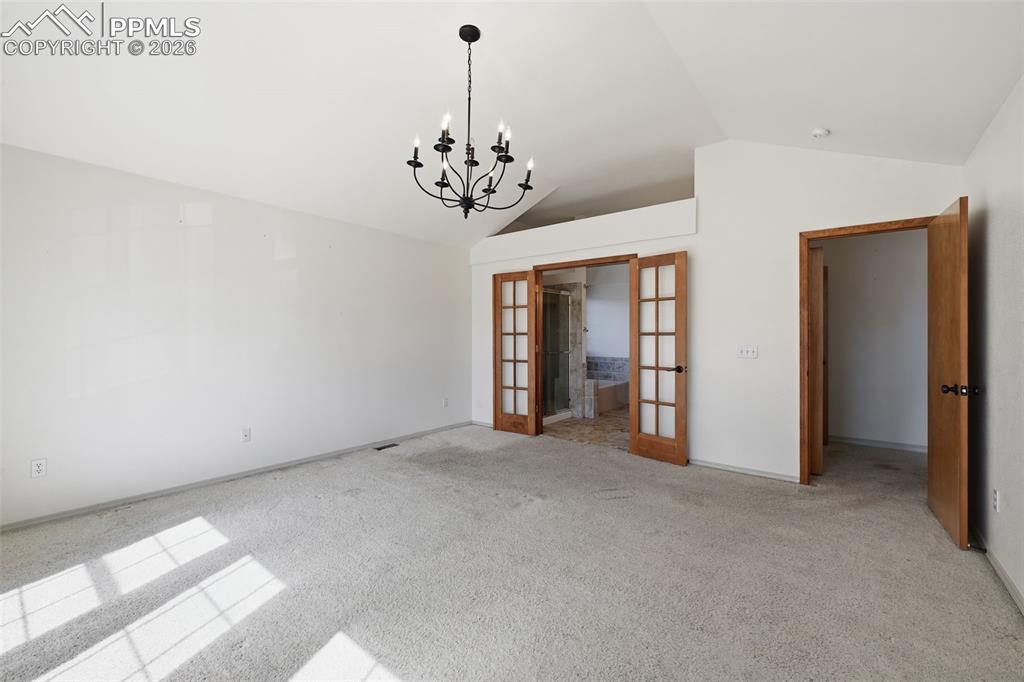 Image 23 of 50: Master Bedroom