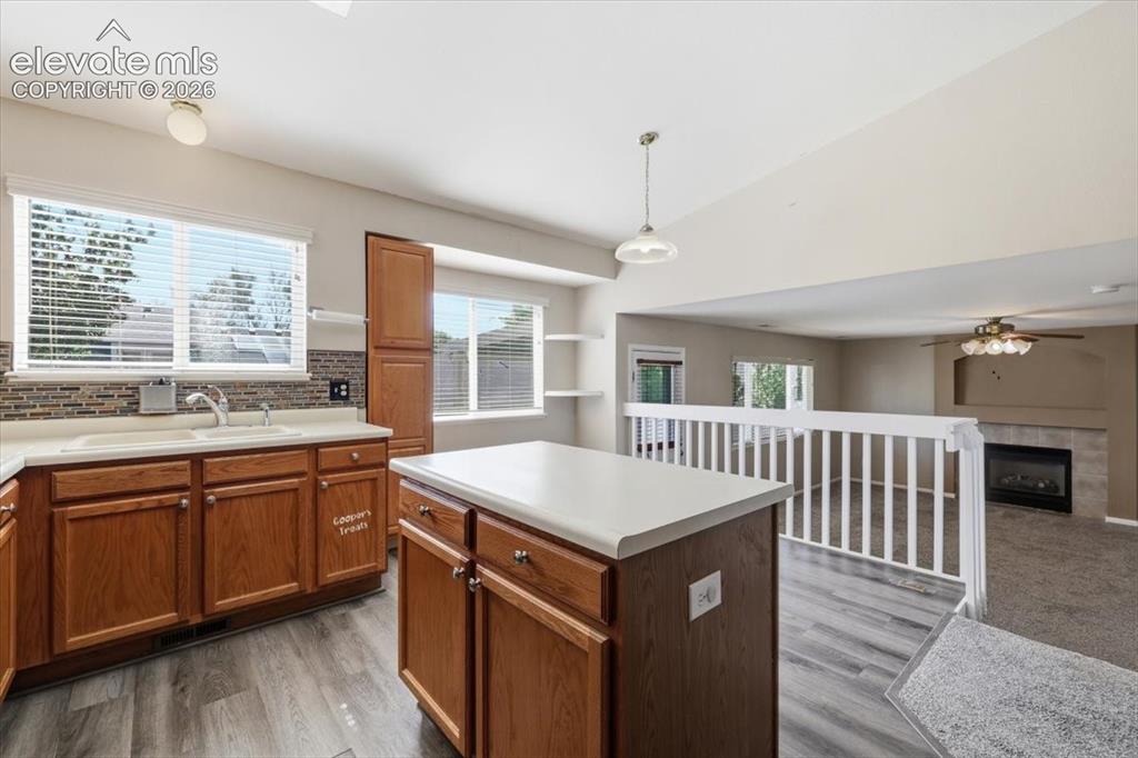 Image 15 of 43: Kitchen opens to the family room.
