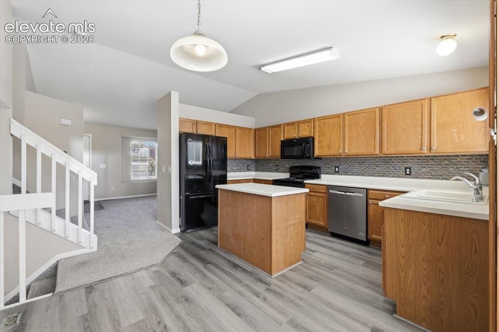 Image 2 of 43: Lots of cabinets and counter space.