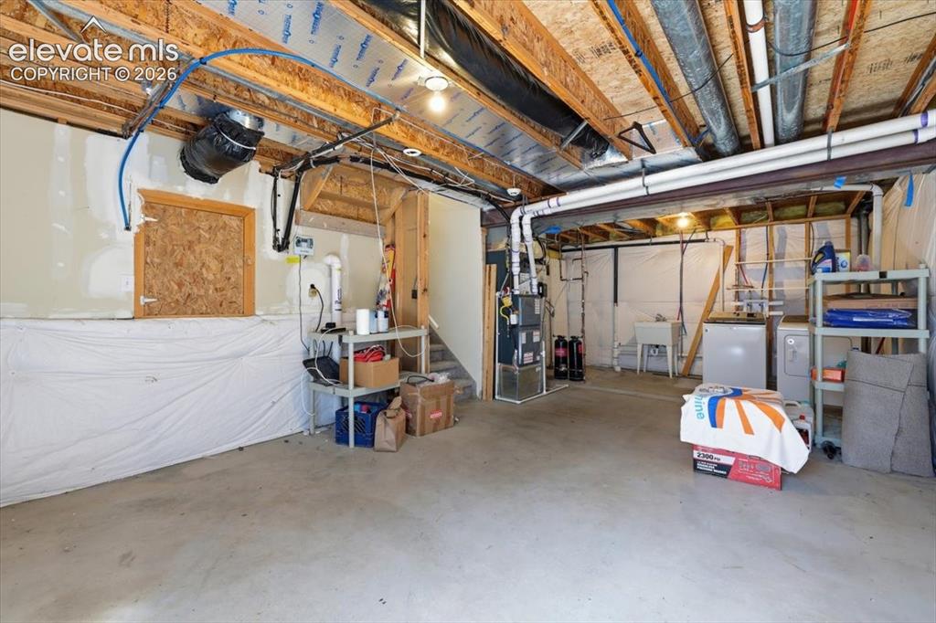 Image 30 of 43: Unfinished basement.