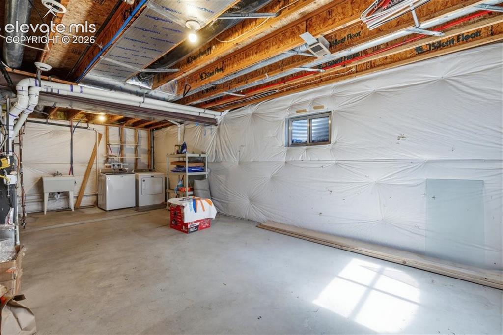 Image 31 of 43: Unfinished basement.