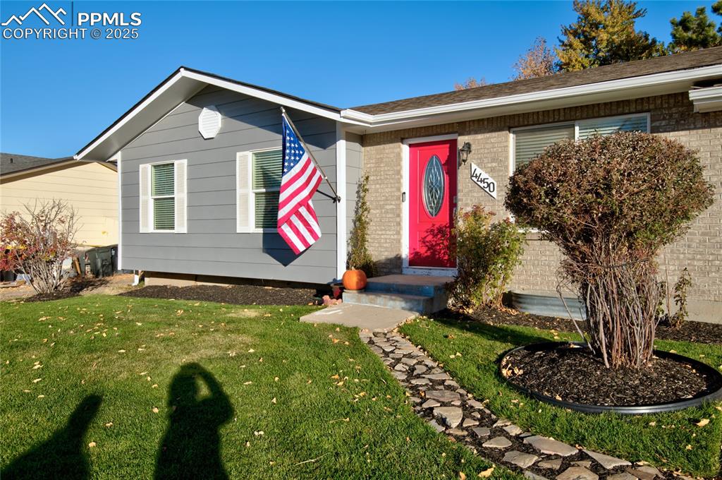 Image 2 of 37: New Exterior Paint. New Front Door. New Roof. New Sod.