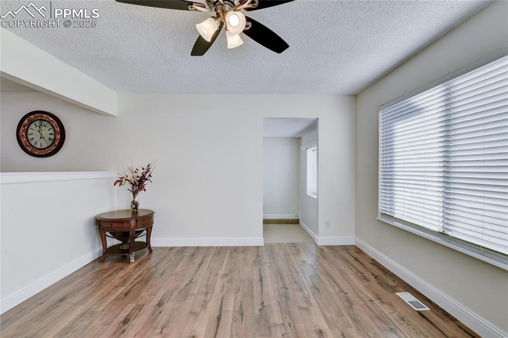 Image 24 of 37: Greet the formal living room when you first enter the home. Imagine putting