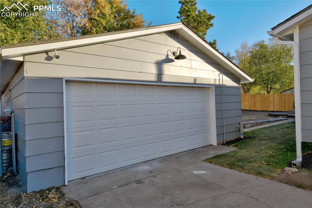 Image 4 of 37: Large Oversized 2 Car Garage with Secret Bonus Room in the Back