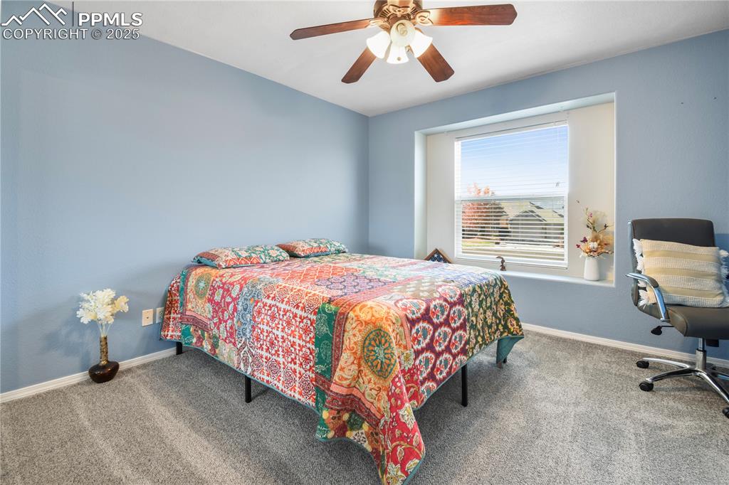 Image 22 of 38: Bedroom