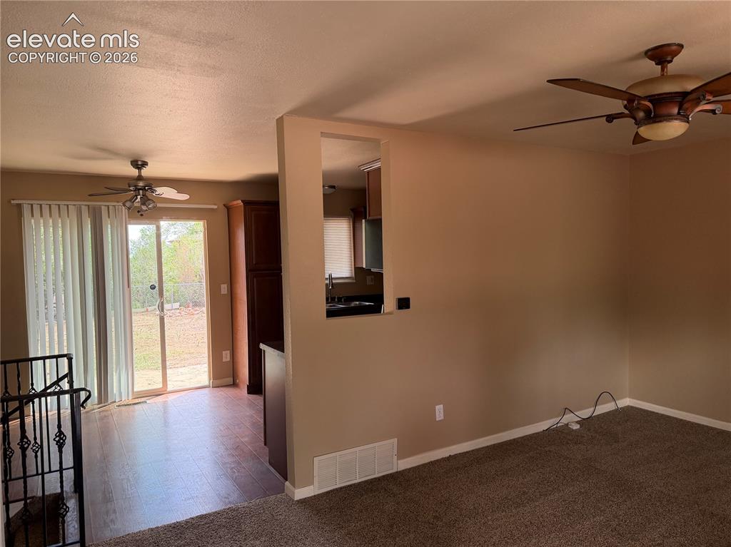 Image 4 of 17: View from front door into dining area