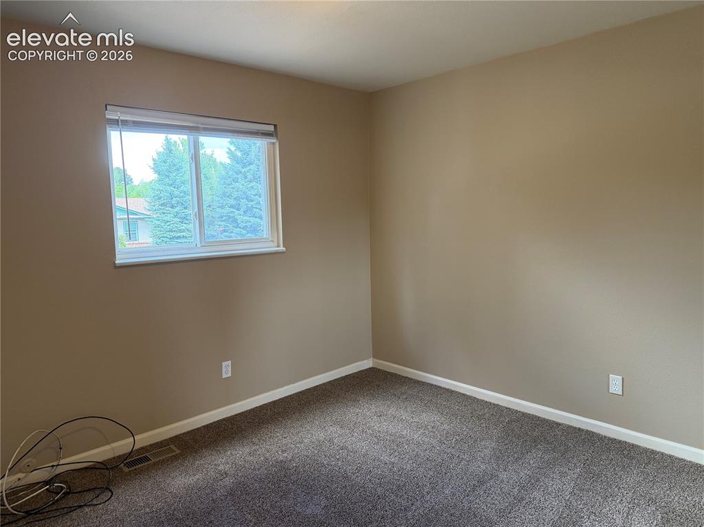 Image 8 of 17: Upper bedroom