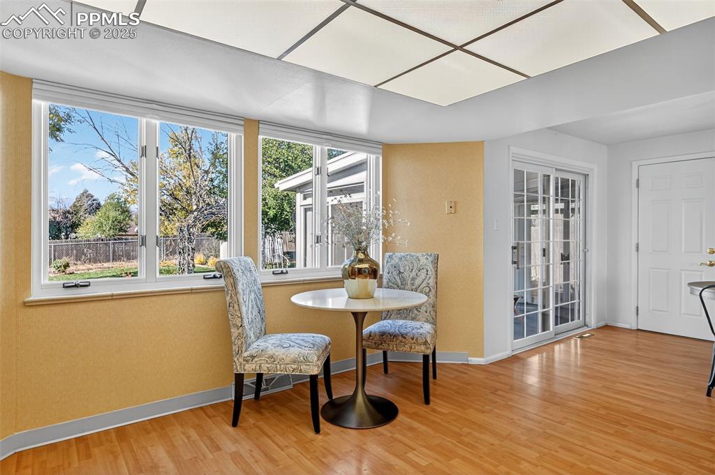 Image 16 of 40: Vinyl windows throughout the home with upgraded newer blinds and a view to 