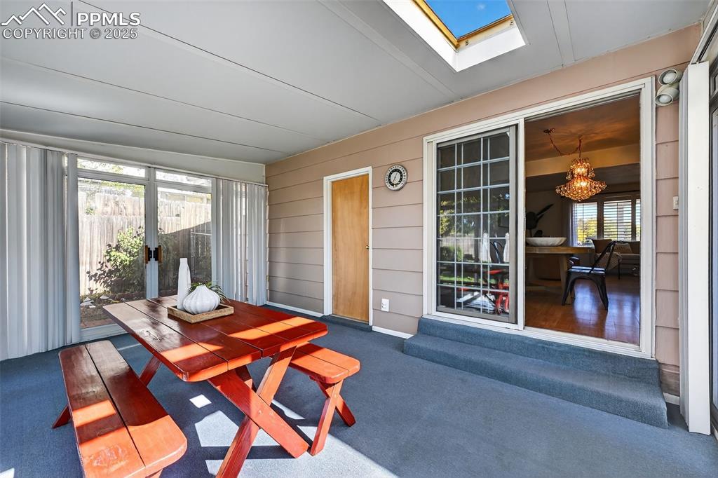 Image 20 of 40: Sun room square is in addition to the home square footage!