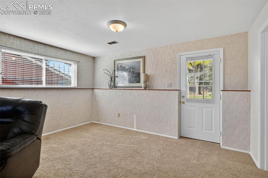 Image 31 of 40: Room for media area and entertainment or study space in the basement!