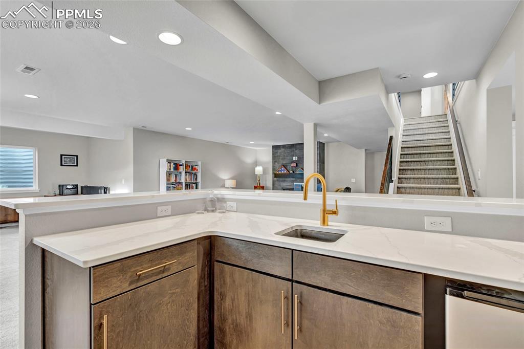 Image 32 of 45: Basement wet-bar