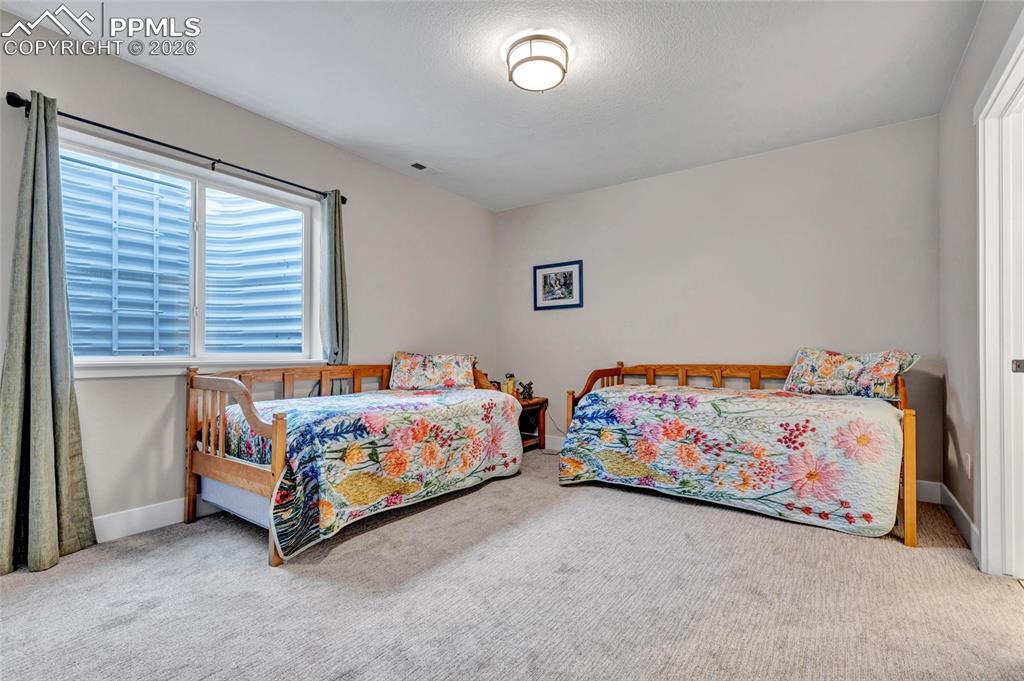 Image 37 of 45: Basement bedroom