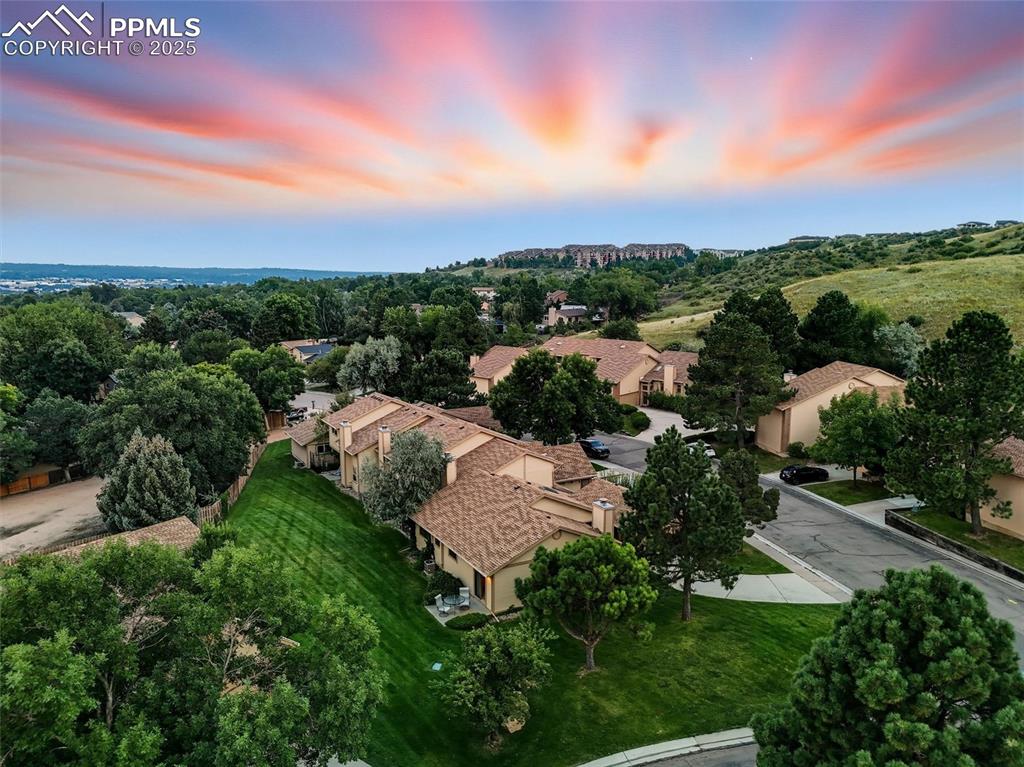 Image 14 of 36: Aerial view of the surrounding bluffs and the city beyond