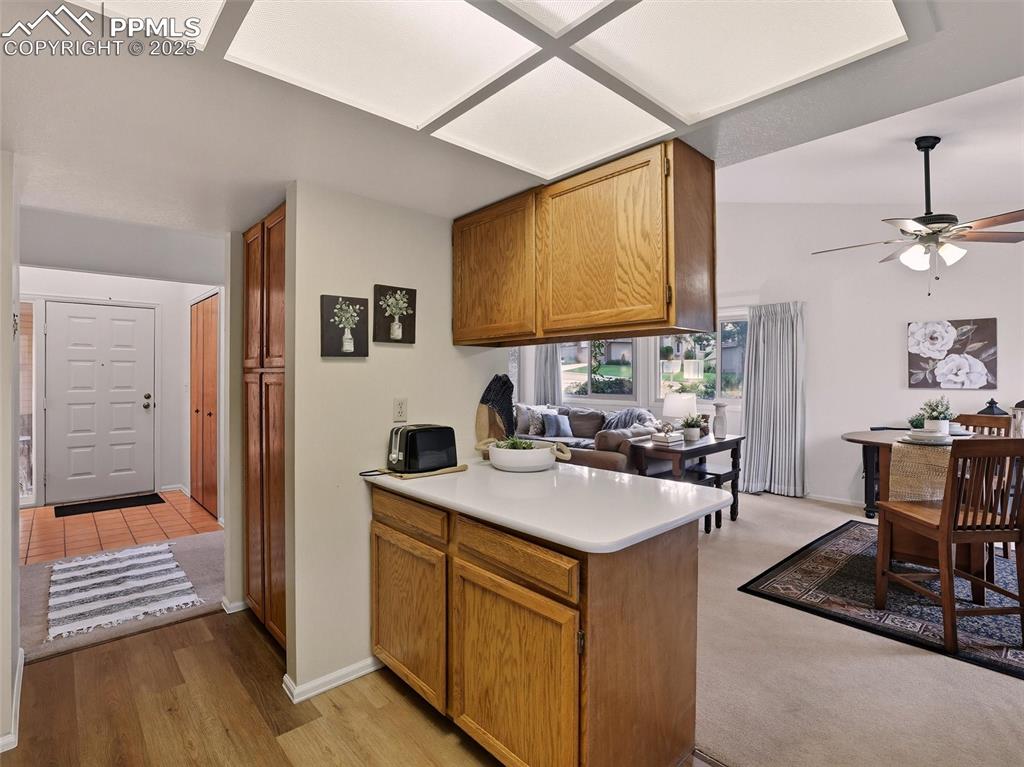 Image 21 of 36: Kitchen opens up to dining room and the front entry foyer for an excellent