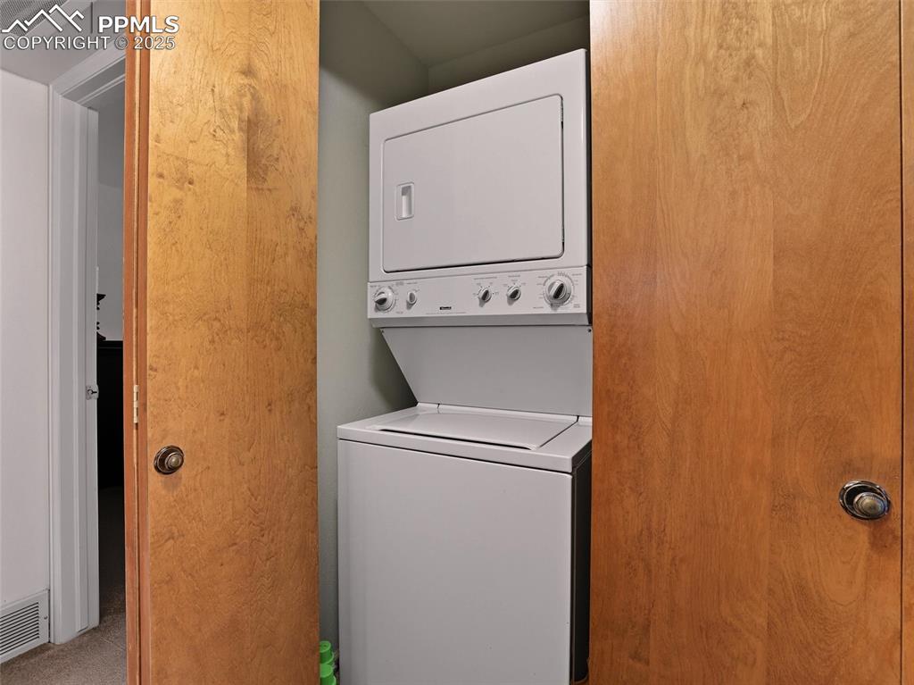 Image 27 of 36: Laundry space conveniently located in the hall closet